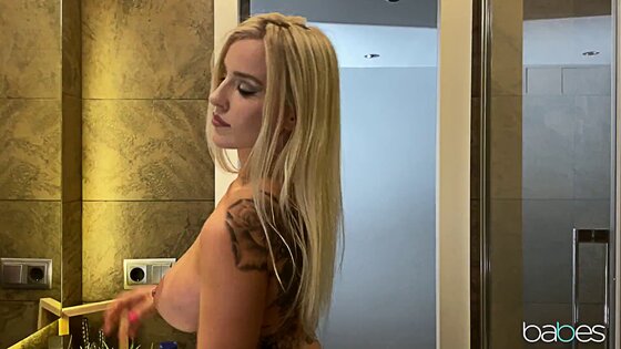 tattoos big tits girl masturbating with her dildo on the wall on the shower